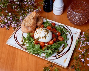 Burrata con pomodori al forno